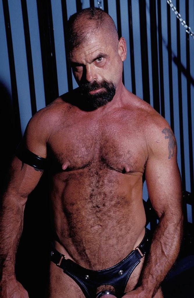 20P Gay bear loves playing his pierced huge cock in leather