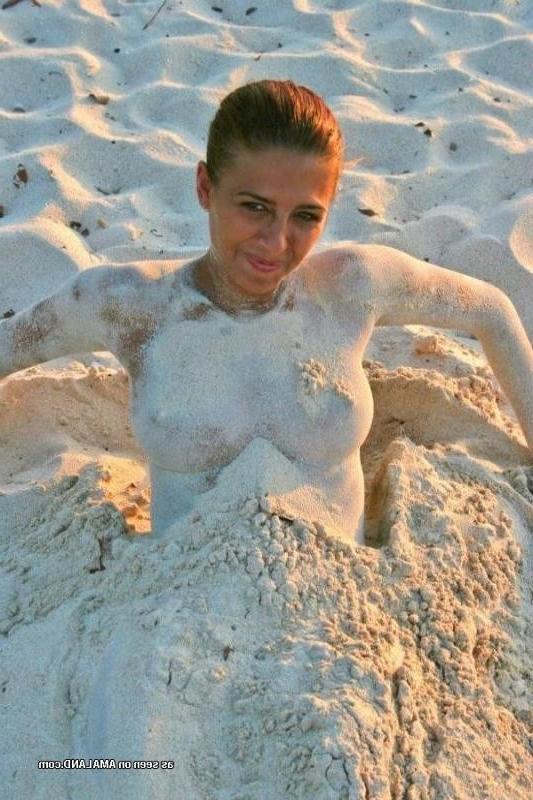 10P Compilation of a sexy Latina babe posing topless at a beach