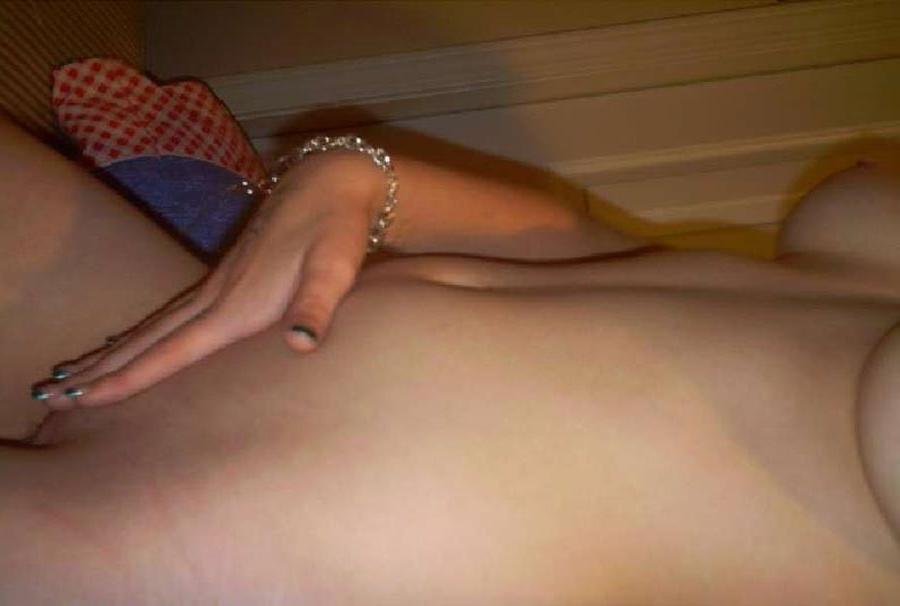 15P Busty amateur cutey taking nude self pics