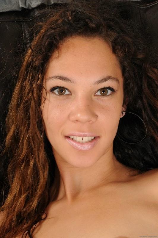15P Cherri Noir shows off her natural lipped pussy