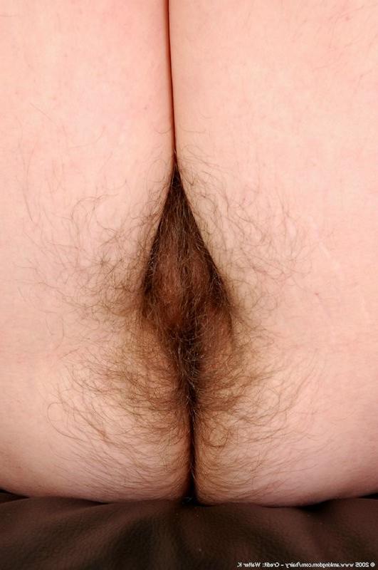 15P hairy redheaded milf exposes her pussy