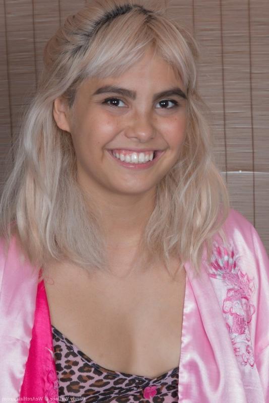 16P Candy Wallace strips naked on her brown sofa