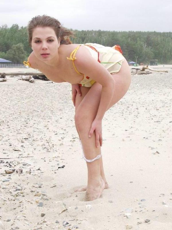 20P Teen loves to tease and exposing her hairy twat in a beach