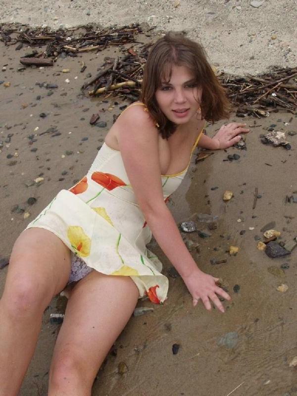 20P Teen loves to tease and exposing her hairy twat in a beach