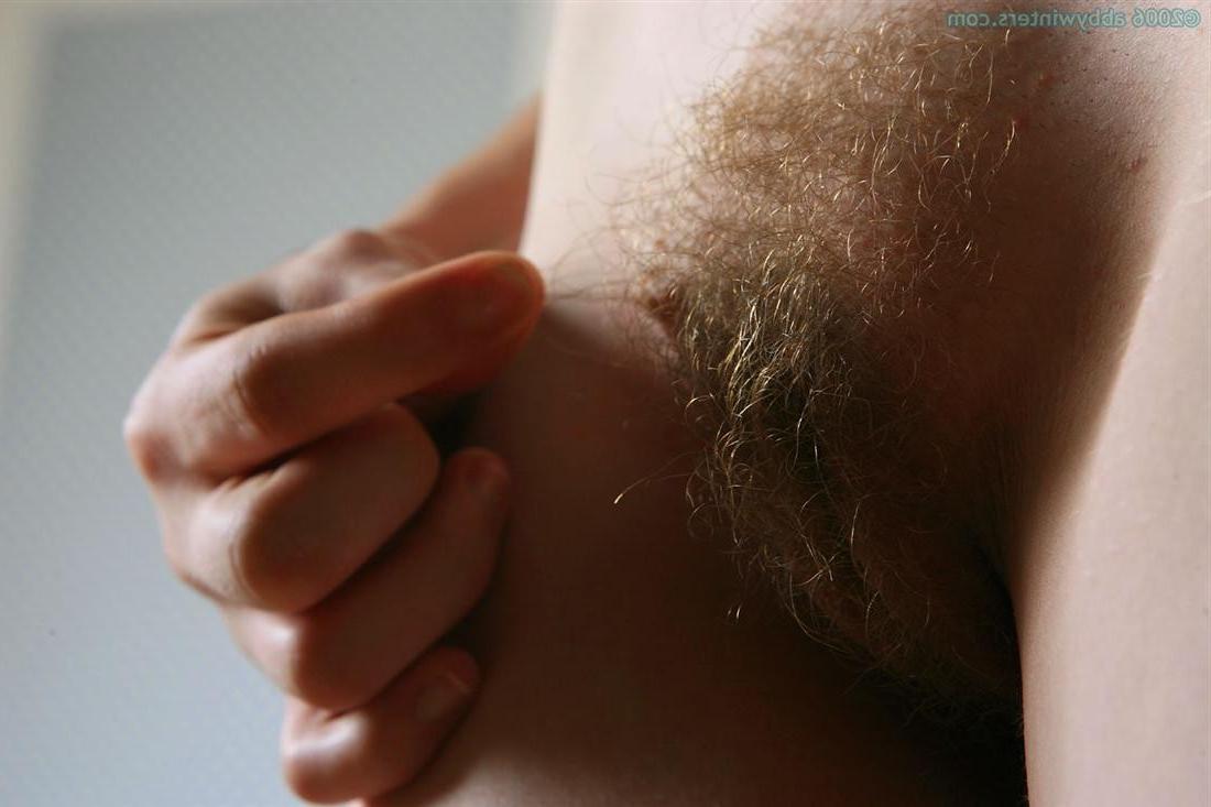 16P Redhead amateur girl strips and spreads her hairy pink pussy