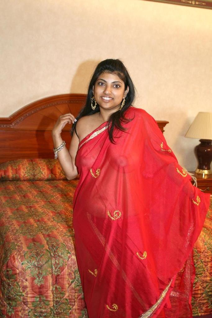 15P Busty Indian lifts her legs