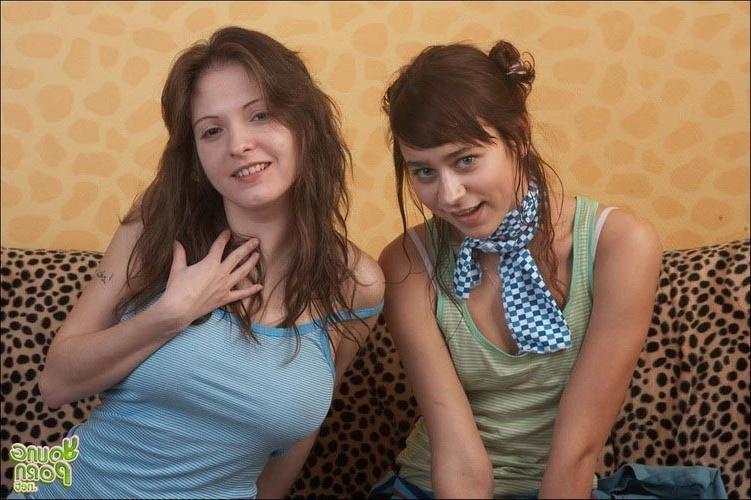 16P Two young amateur lezzies teasing and kissing each other