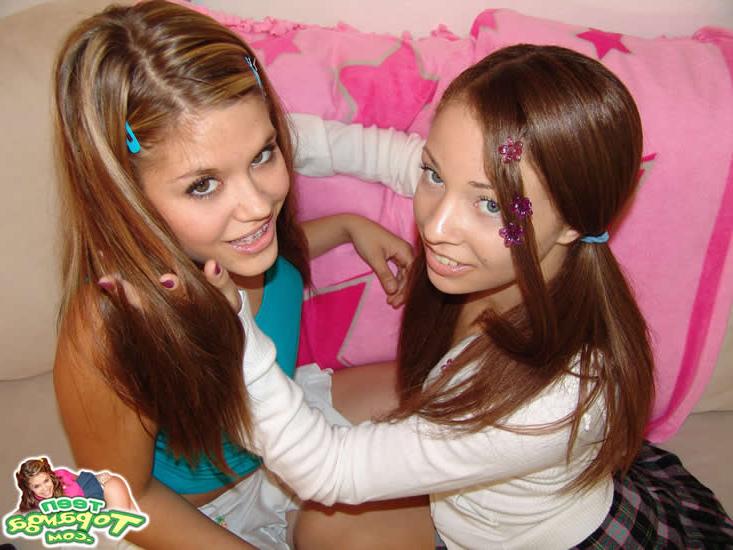 15P Two naked teenie lesbians kiss and lick