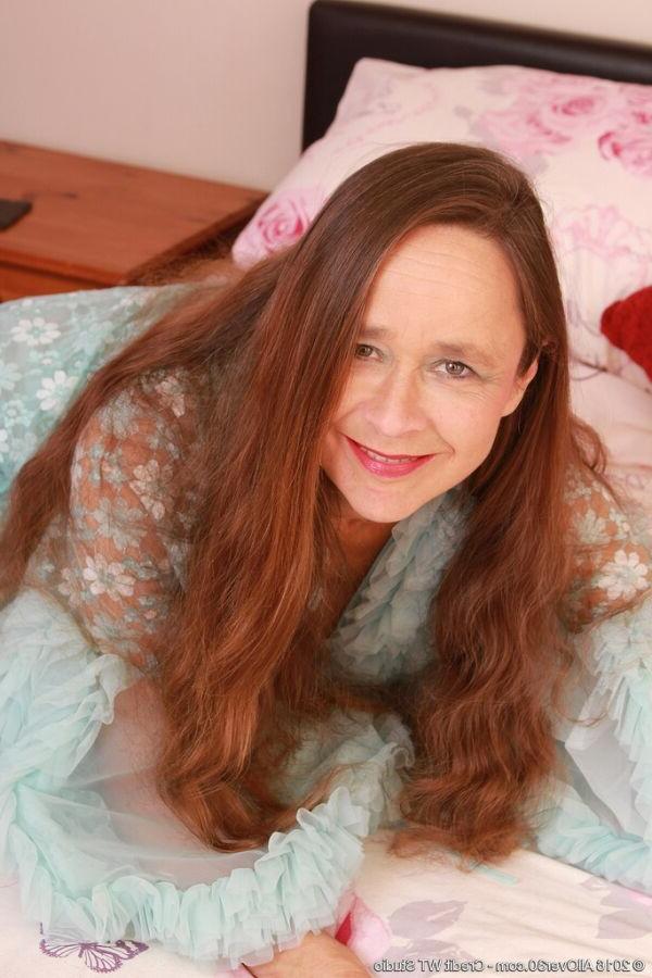15P Josie Posie busty mom in tan stockings spreads on bed