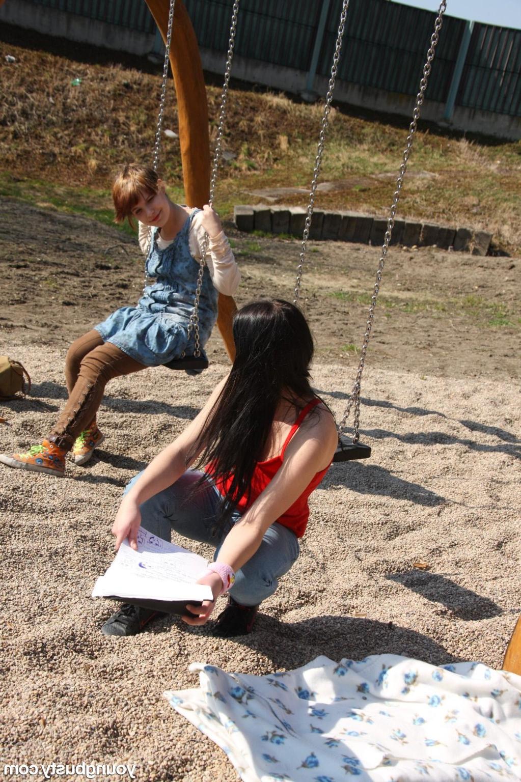 15P Young busty lesbian teens lick and finger pussies outdoors