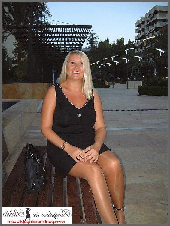 15P amateur woman showing her stockings outside