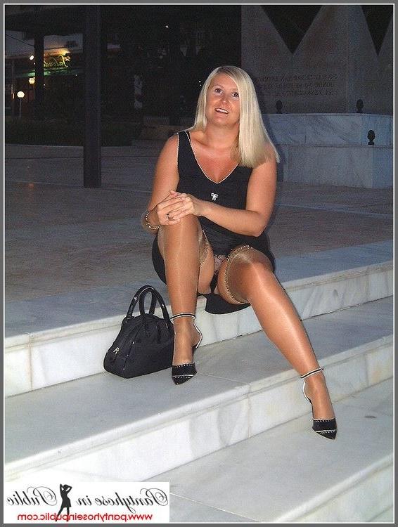 15P amateur woman showing her stockings outside