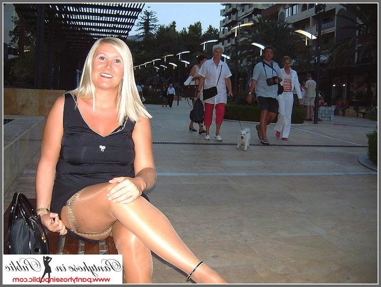 15P amateur woman showing her stockings outside