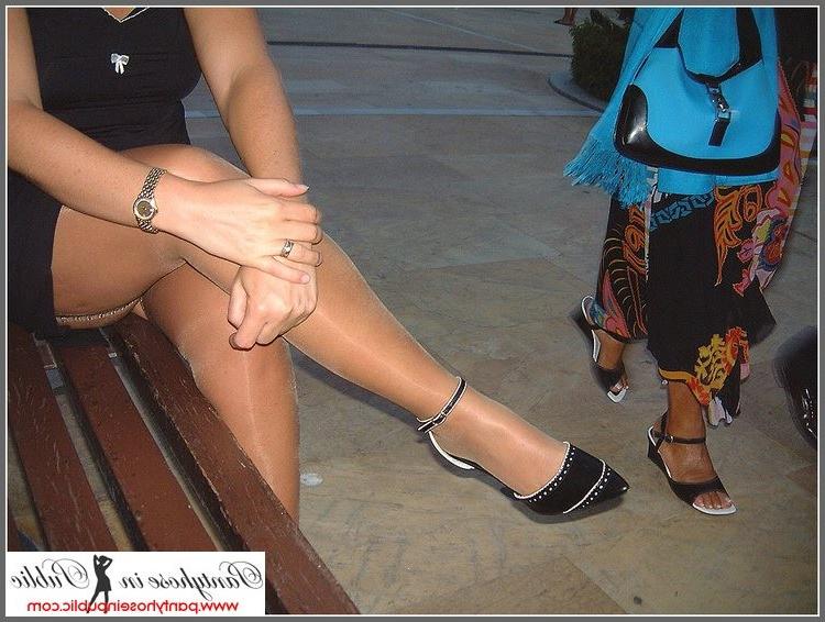 15P amateur woman showing her stockings outside