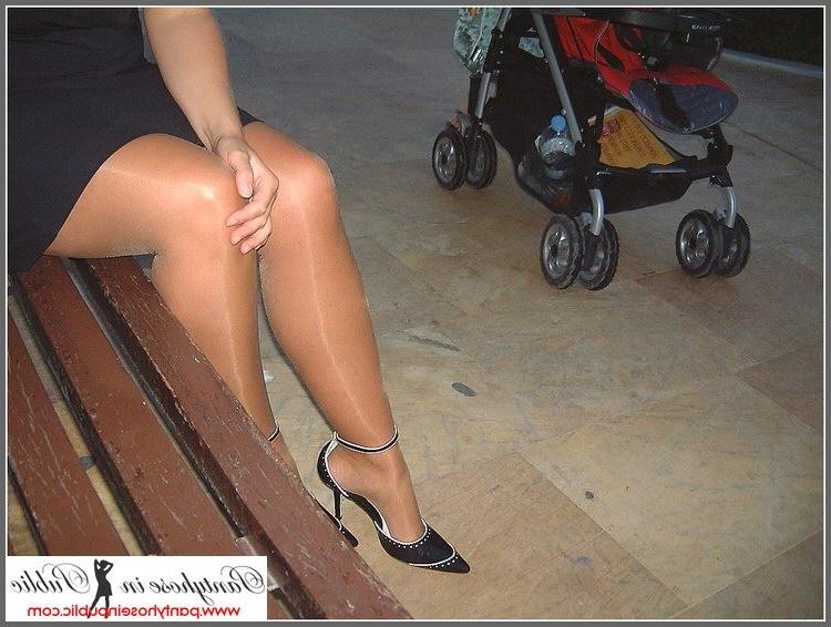 15P amateur woman showing her stockings outside