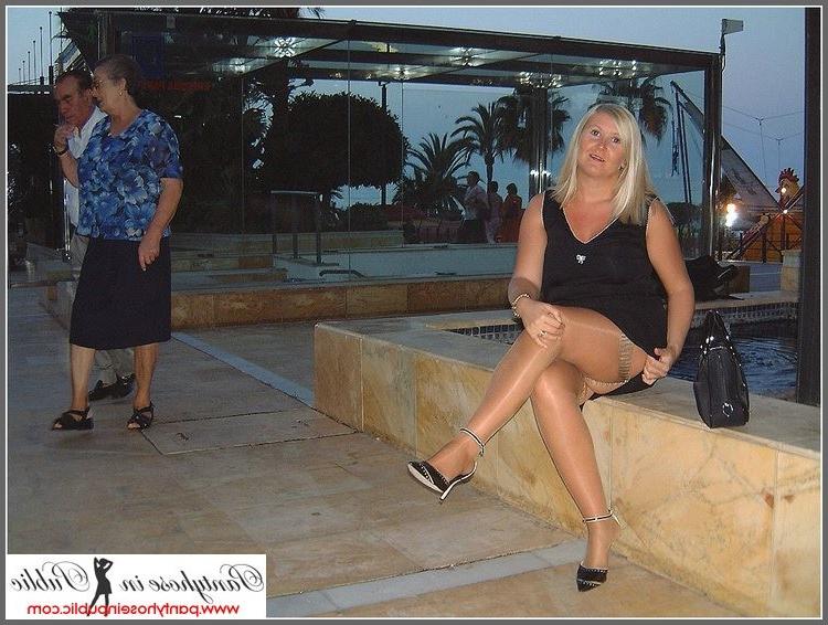 15P amateur woman showing her stockings outside