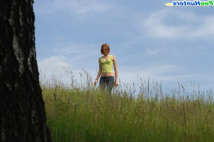 16P Girlie takes a leak sitting on top of a huge rock