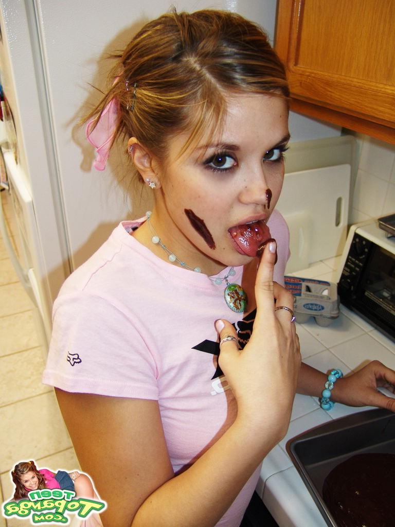 15P Eighteen year old bakes cake and strips in kitchen