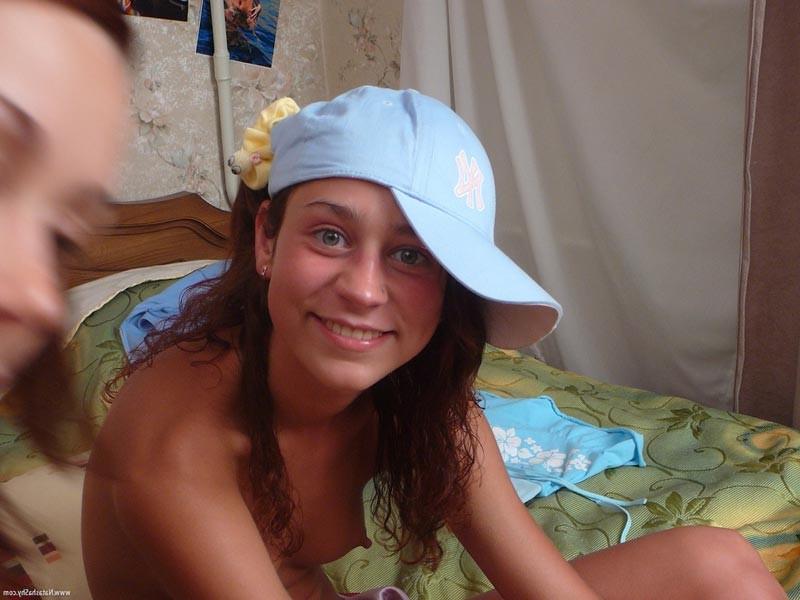 15P Petite hot and sexy teen babe poses and teases on her bed