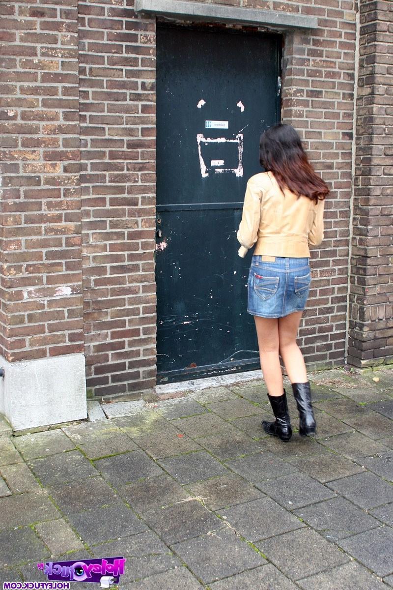 14P Brunette sweetie sucks a cock through the wall in the toilet