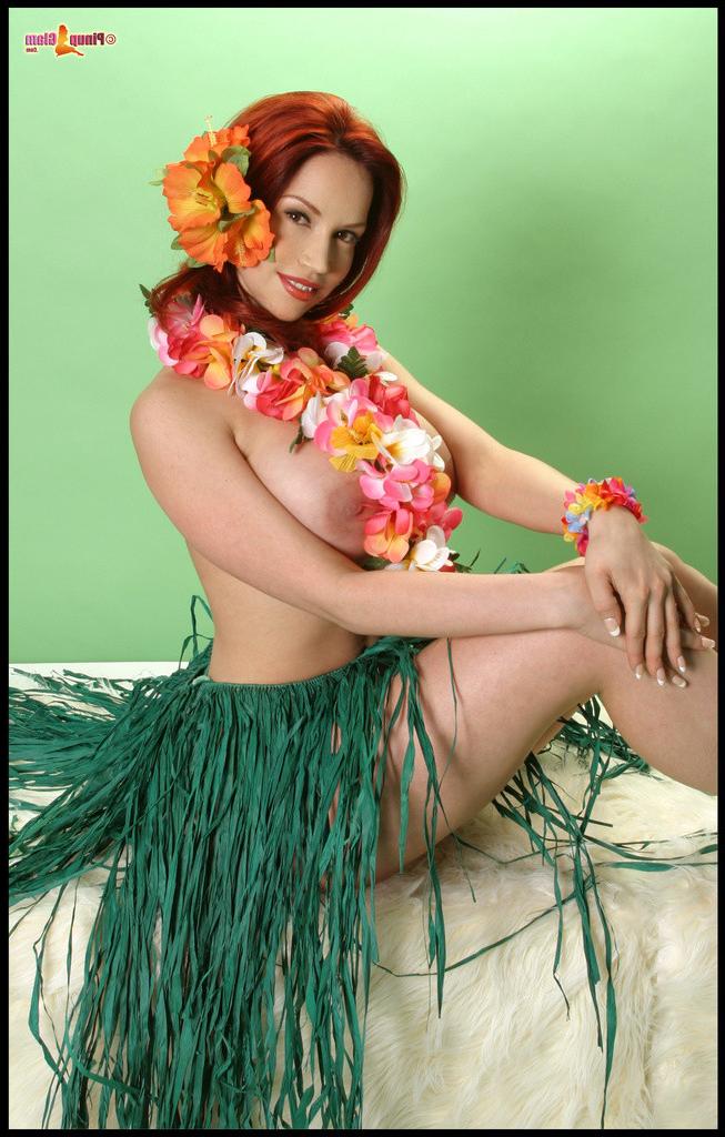 15P Busty Redhead Bianca Beauchamp Stripteases in a Hula Skirt and Flashes Her Big B