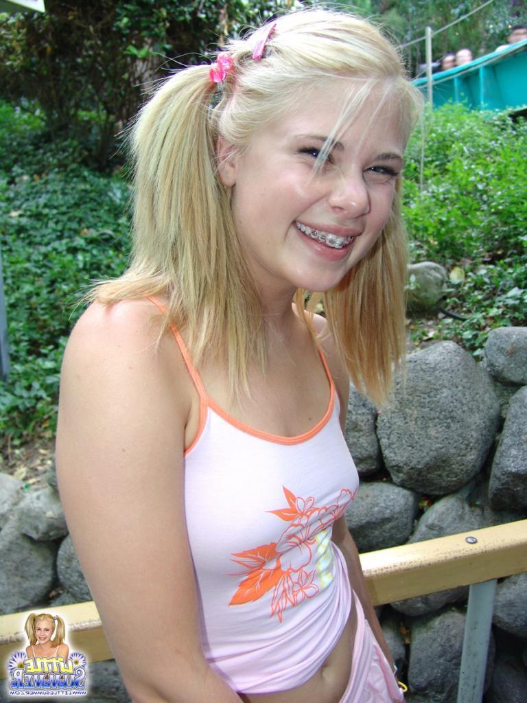16P A happy playing teen chick outdoors having fun