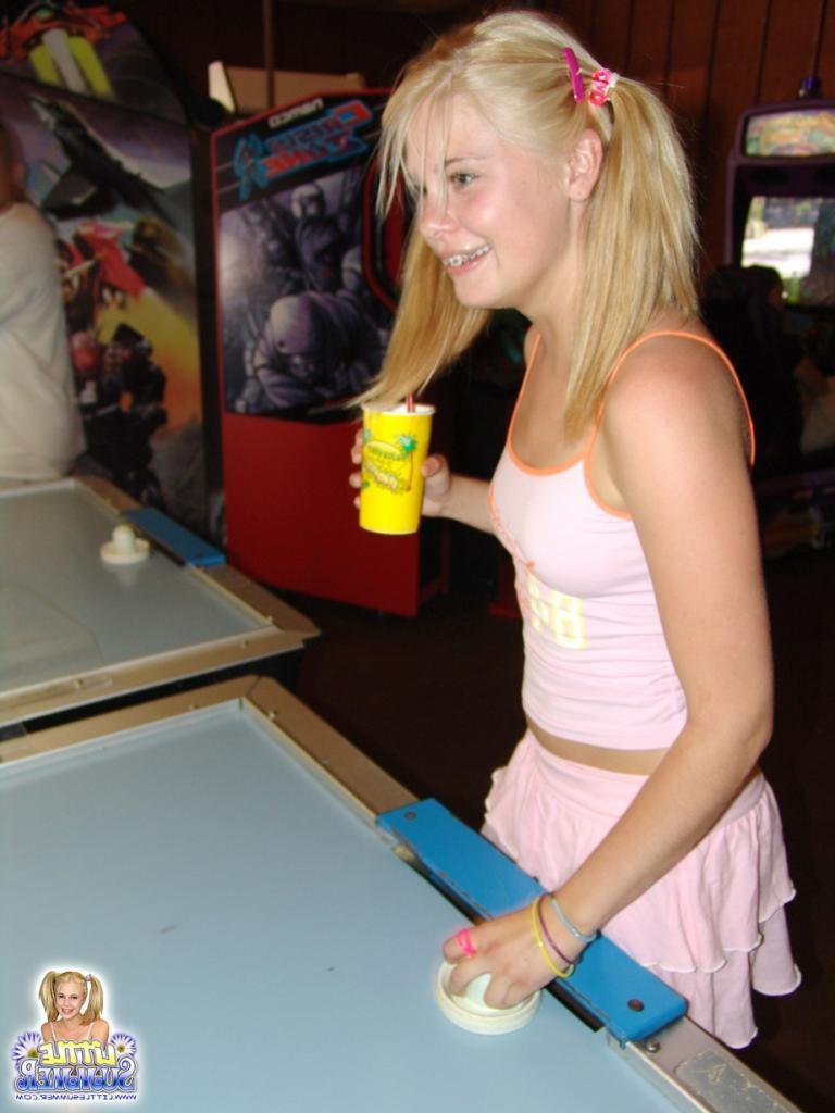 16P A happy playing teen chick outdoors having fun