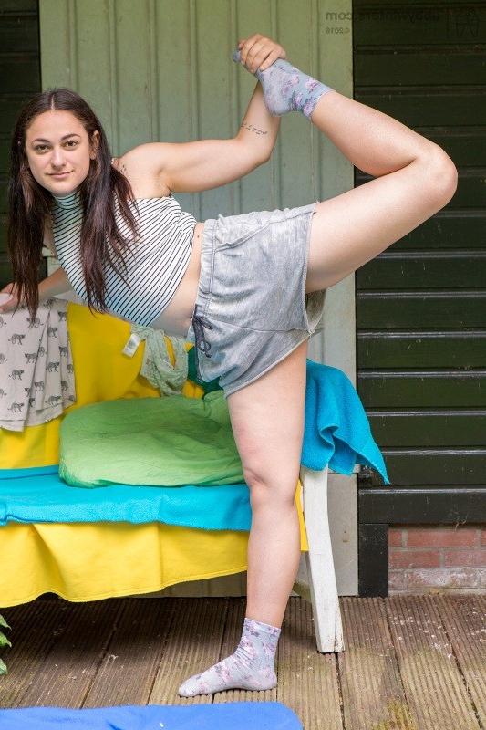 16P Sabrina smiles seductively at the camera