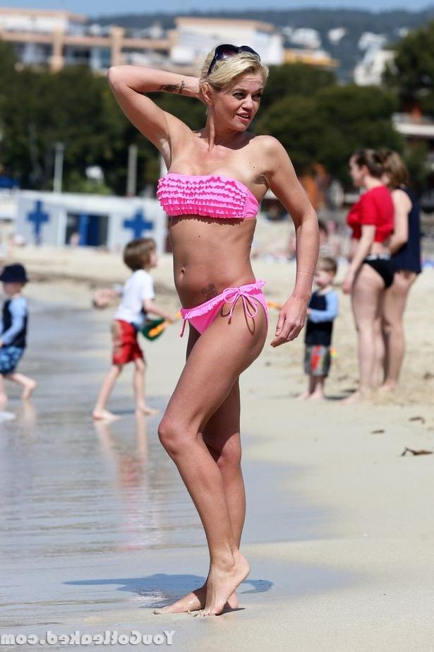 10P DANNIELLA WESTBROOK topless on a beach