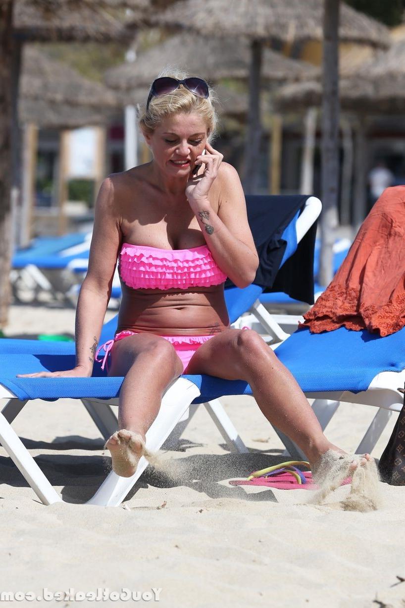 10P DANNIELLA WESTBROOK topless on a beach