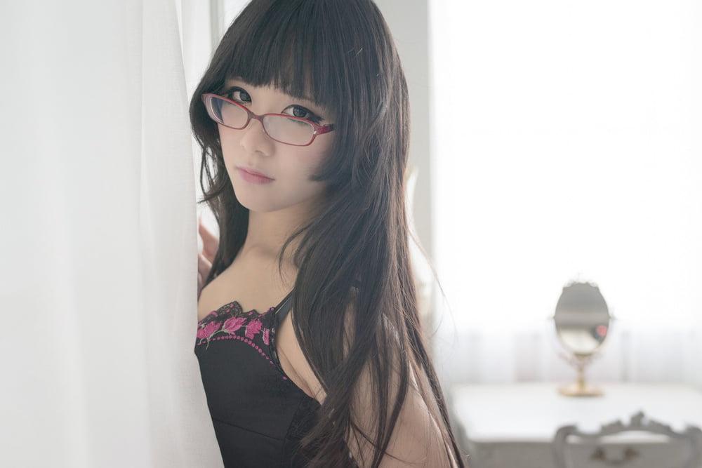 25P Eri Kitami wearing tight corset and stockings