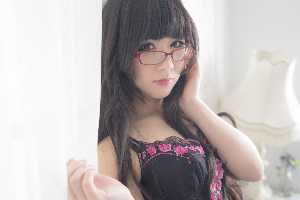 25P Eri Kitami wearing tight corset and stockings