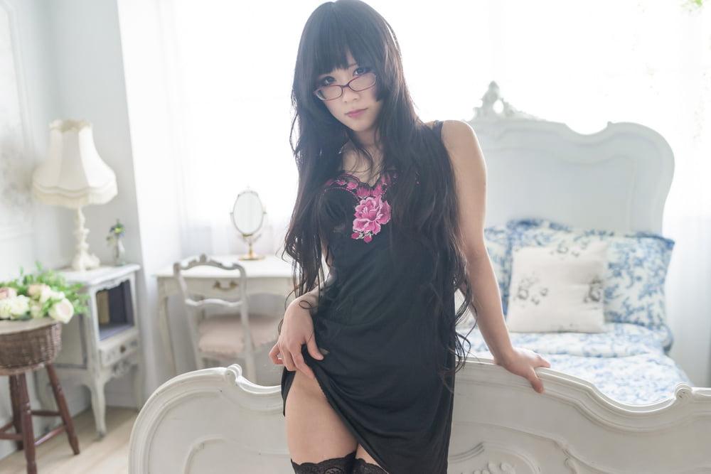 25P Eri Kitami wearing tight corset and stockings
