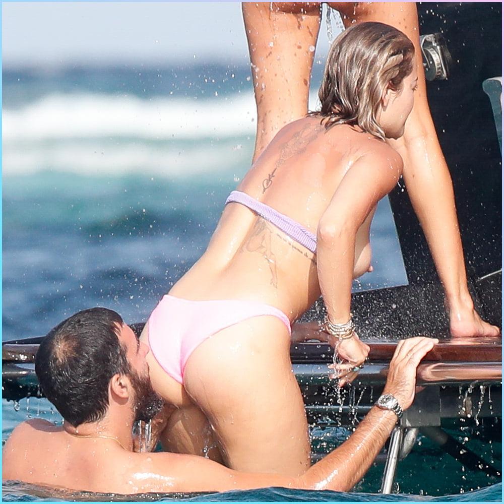 25P Rita Ora Oops Topless Bikini 07-29-2020