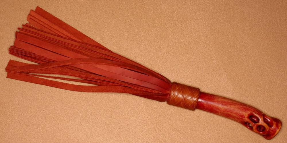5P Vermilion. Nubuck leather flogger.