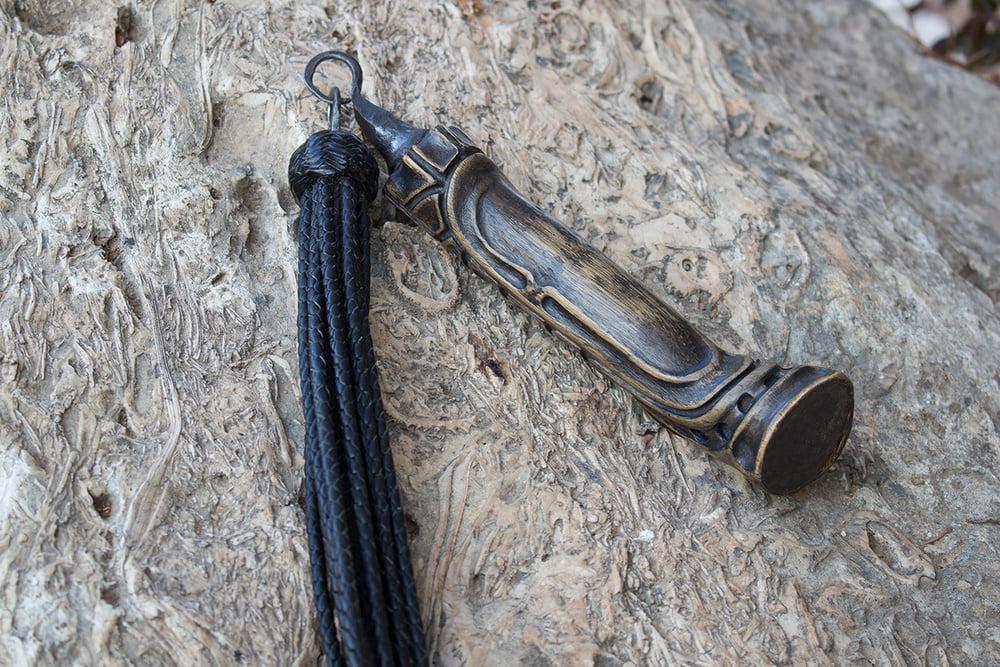 9P Gavial. 12-tail leather braided flogger.