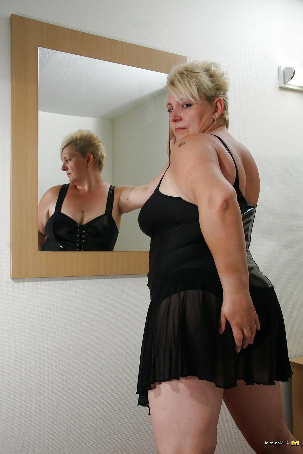16P Busty dutch mature toying on bed