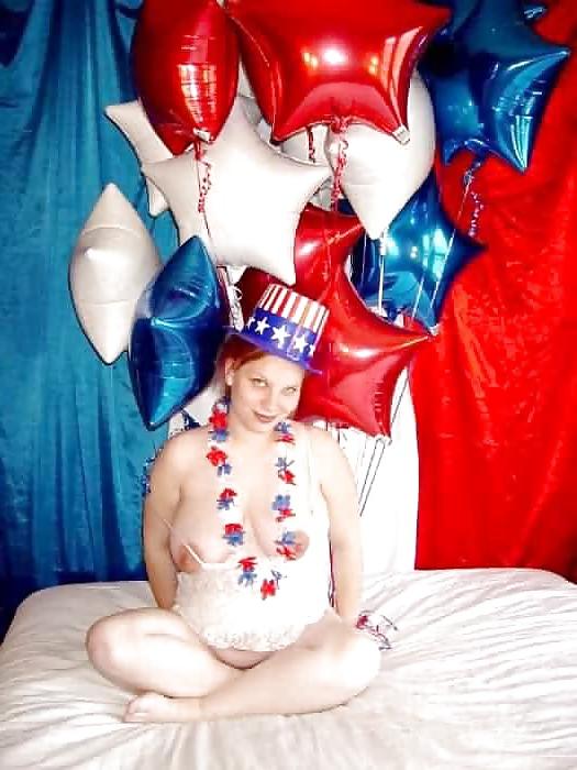 15P Pregnant redhead in white red and blue
