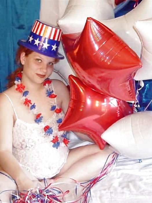 15P Pregnant redhead in white red and blue