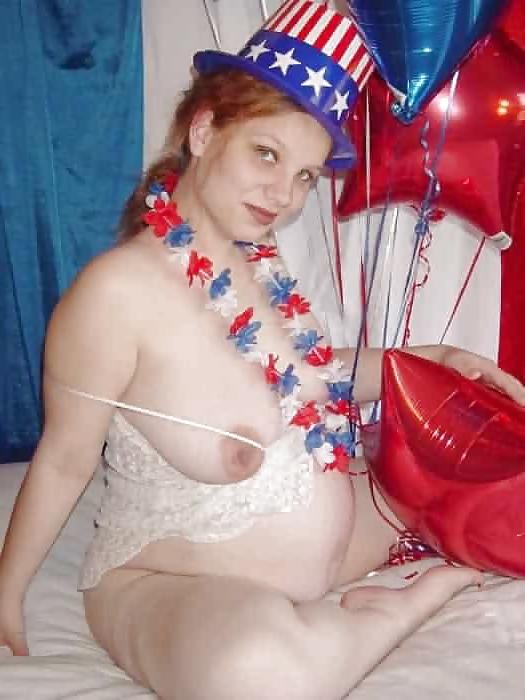 15P Pregnant redhead in white red and blue