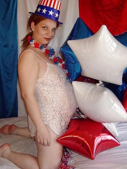15P Pregnant redhead in white red and blue