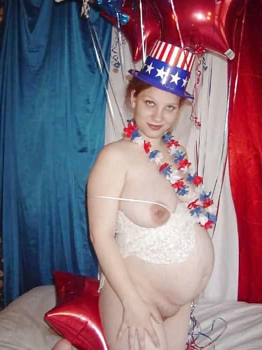 15P Pregnant redhead in white red and blue