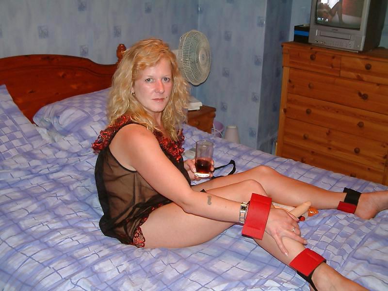 14P Mature posing in bed