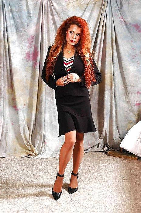16P Susan Evans in black dress