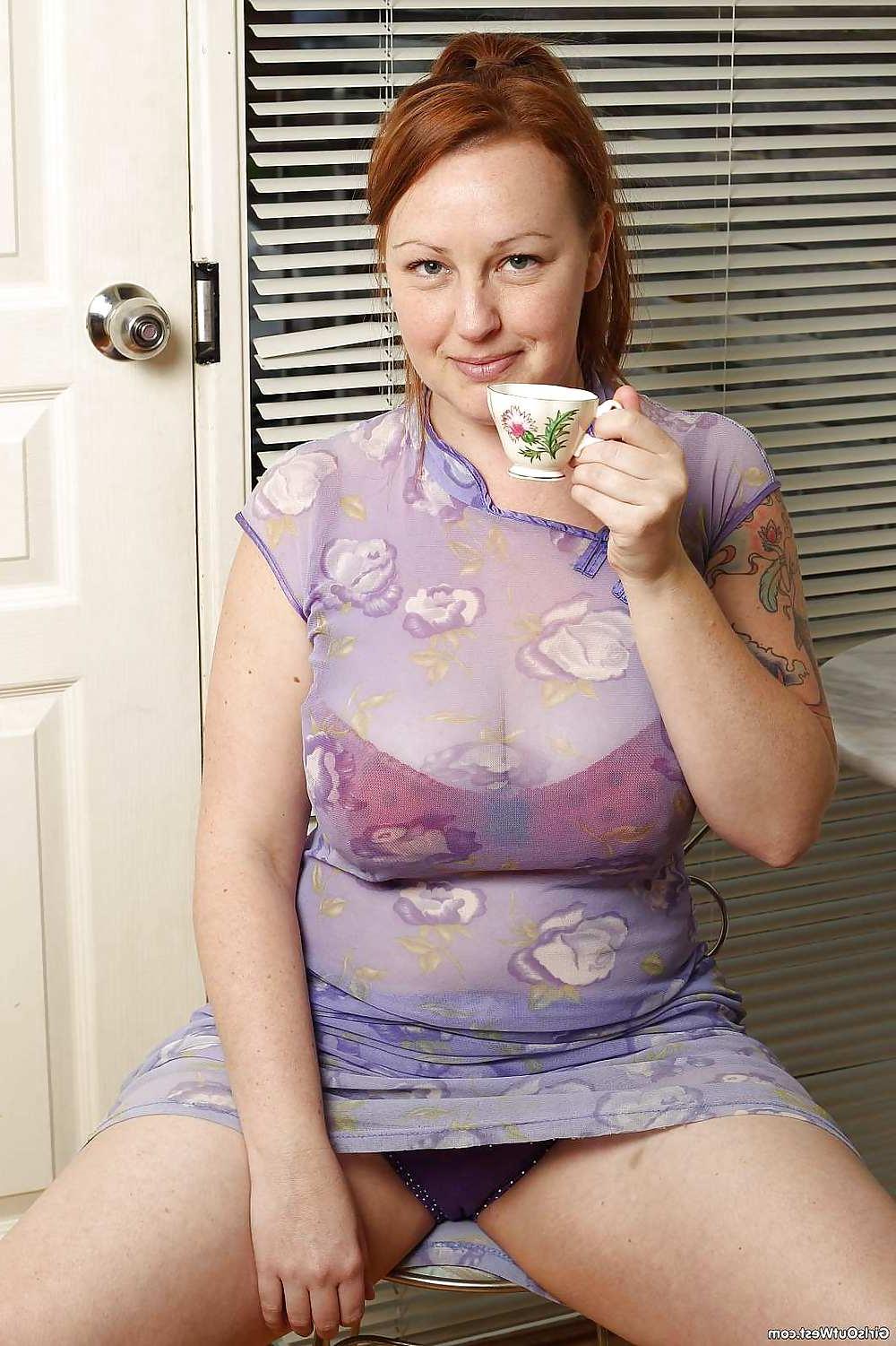 16P Busty plump amateur spilling tea on her juggs