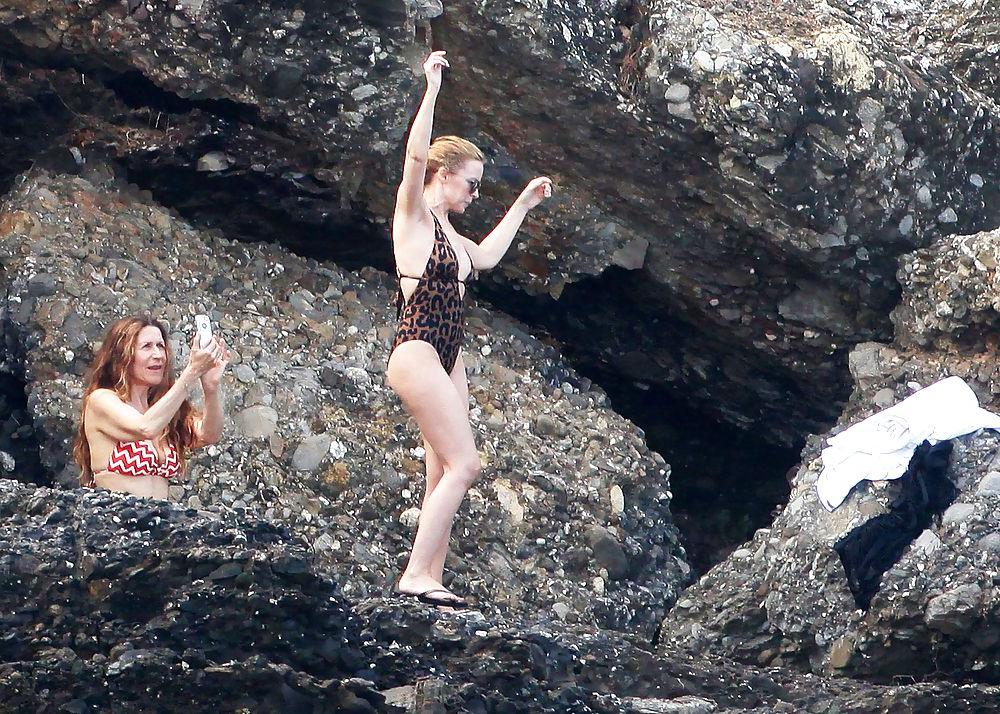 25P Kylie Minogue hot ass in swimsuit