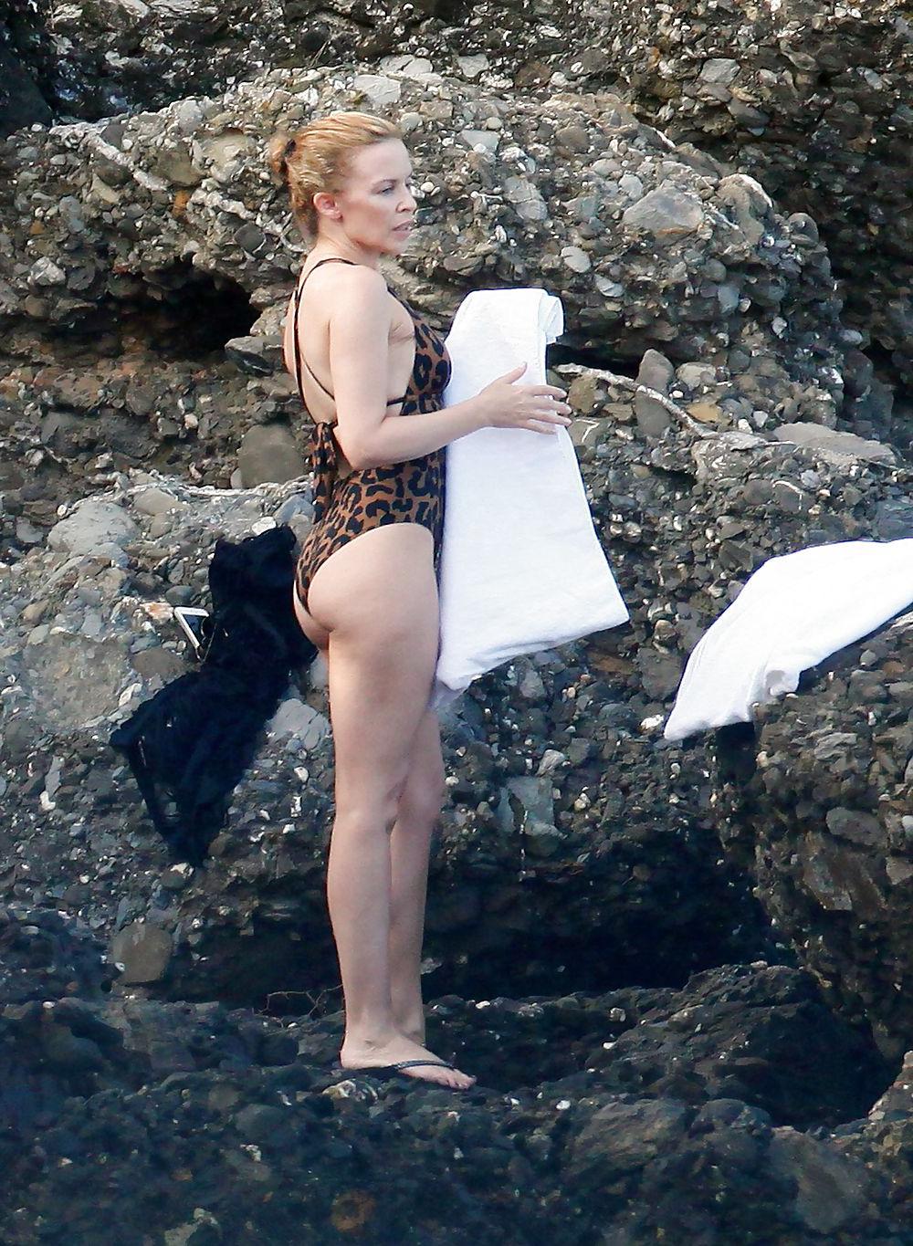 25P Kylie Minogue hot ass in swimsuit