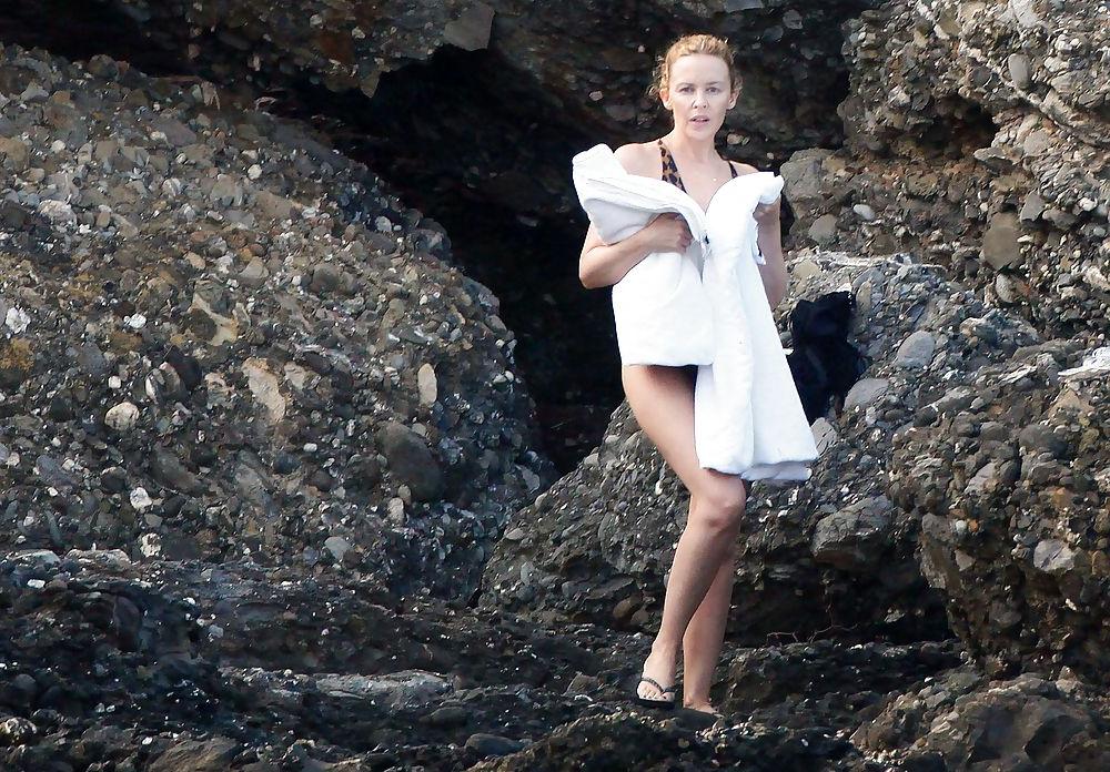 25P Kylie Minogue hot ass in swimsuit