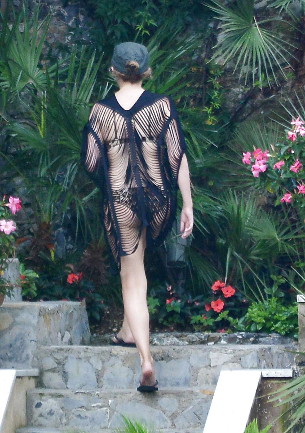 25P Kylie Minogue hot ass in swimsuit