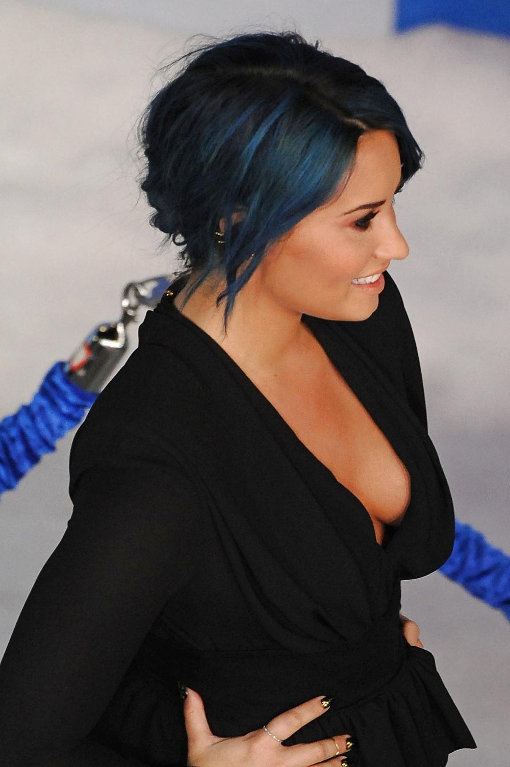 25P Demi Lovato with blue hair and business style